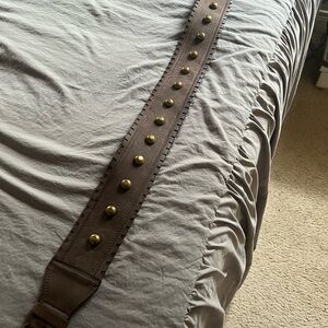 Brown belt.  Don’t know brand